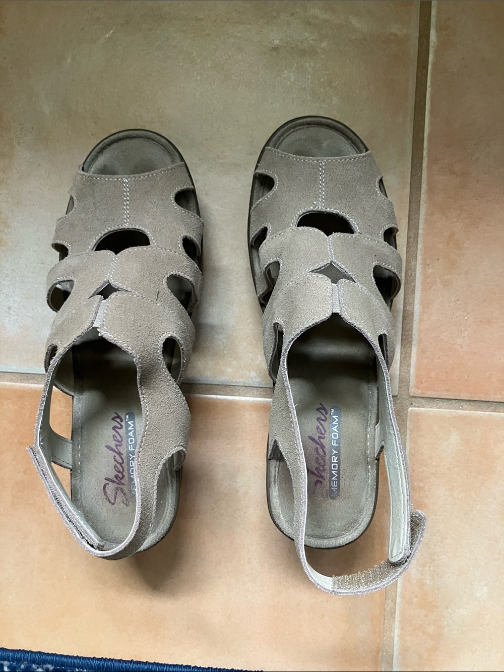 These are memory foam Skechers open toe sandals.